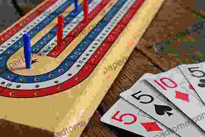 A Close Up Of A Player's Cribbage Hand With Various Cards Cribbage: How To Play And Win