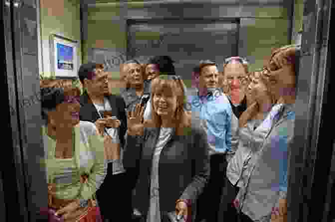 A Group Of Diverse Passengers Inside An Elevator Elevator Man Stories