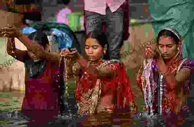 A Group Of People Performing A Ritual Bathing Ceremony On The Banks Of The Ganges River In Varanasi. Recovering Cynic: Travelogues Of Emotional Healing