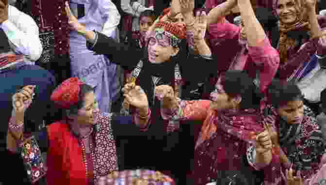 A Group Of Women In Vibrant Sindhi Attire, Adorned With Intricate Jewelry, Performing A Traditional Dance My Sindh: A Journey To The Beloved Homeland