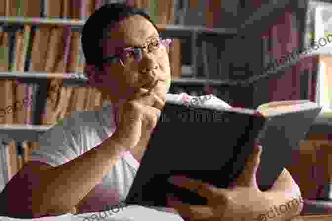 A Person Reading A Book In A Library, Symbolizing The Power Of Knowledge And Self Reflection Creating The Culture Of Self Discipline: Guide To Mastering Self Discipline: Discipline Techniques