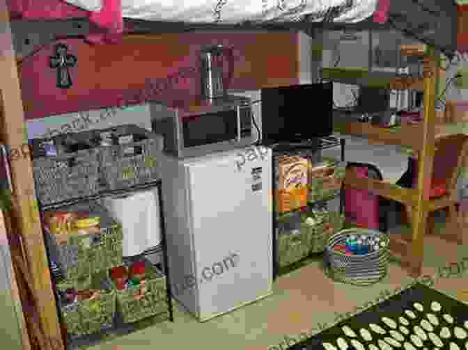 A Photo Of A Dorm Room Kitchen With A Student Learning Essential Cooking Techniques Dorm Room Kitchen