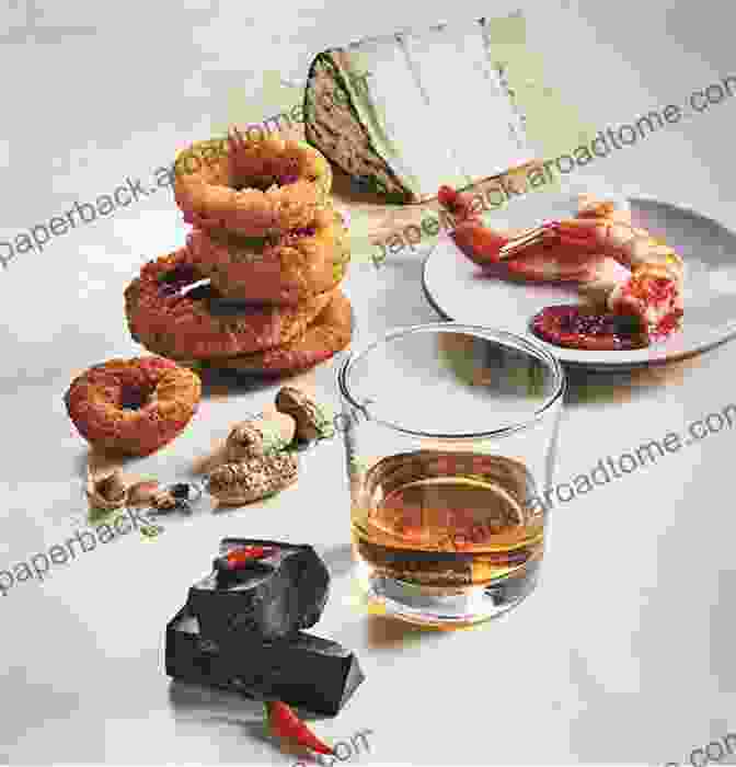 A Plate Of Food Paired With A Glass Of Whiskey The Little Of Whiskey: Sip Eat Drink