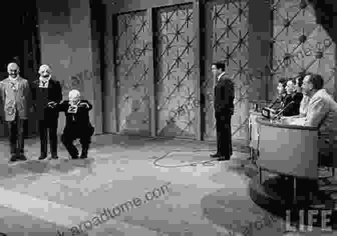 Black And White Photo Of Contestants On A Television Game Show In The 1950s, Surrounded By Elaborate Set Design And A Live Audience Quizzing America: Television Game Shows And Popular Culture In The 1950s