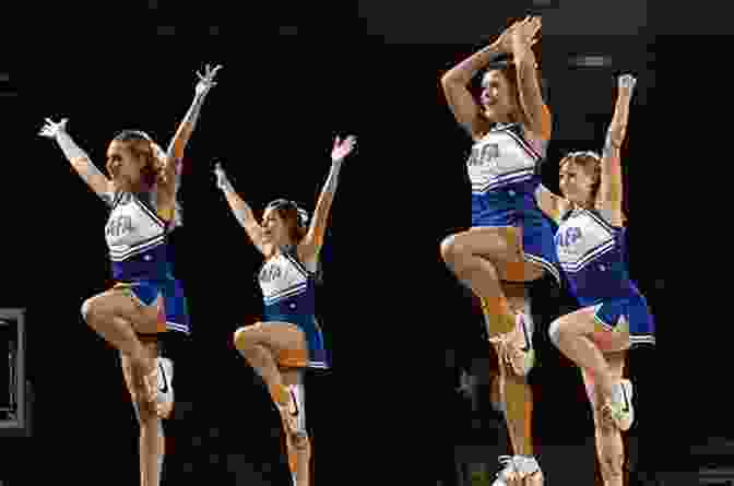 Cheerleaders Performing A Stunt Cheerleading: History Guide Or Some Facts About Cheerleading: The Young Athlete S Guide